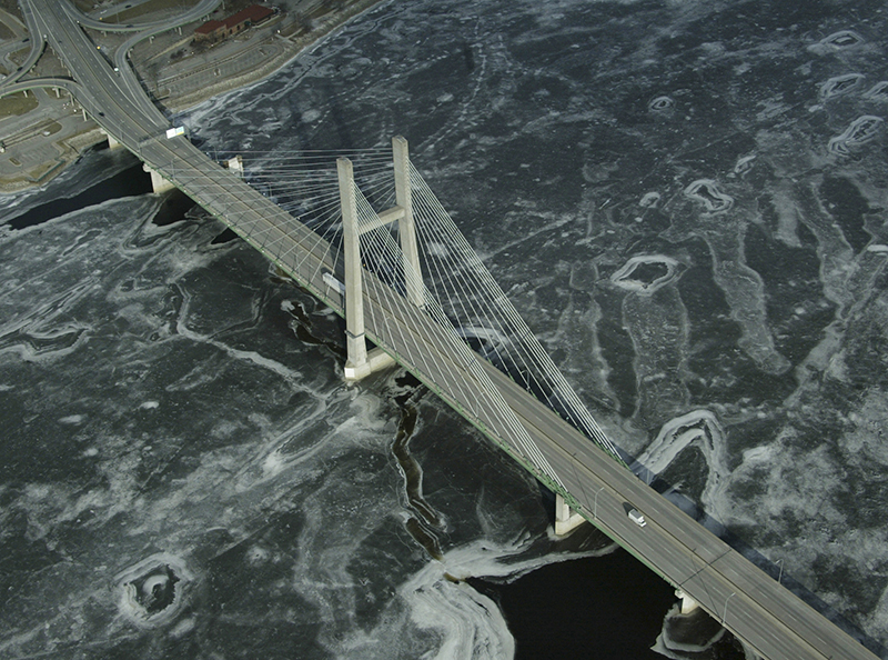 The Great River Bridge spans the frozen Mississippi River from Burlington to Illinois Feb. 5, 2003. | John Gaines | The Hawk Eye