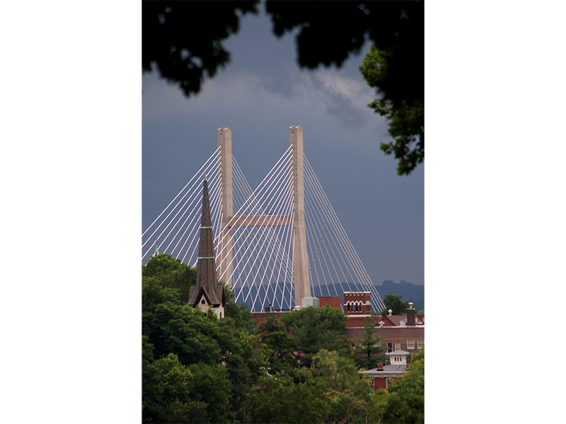 Storm clouds blow across downtown and the Great River Bridge dropping a sprinkle of rain June 23, 2010 in Burlington. | John Gaines | The Hawk Eye